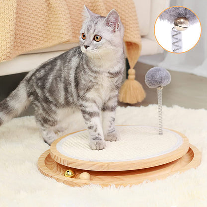 Cat standing on wooden cat scratcher toy with spring ball
