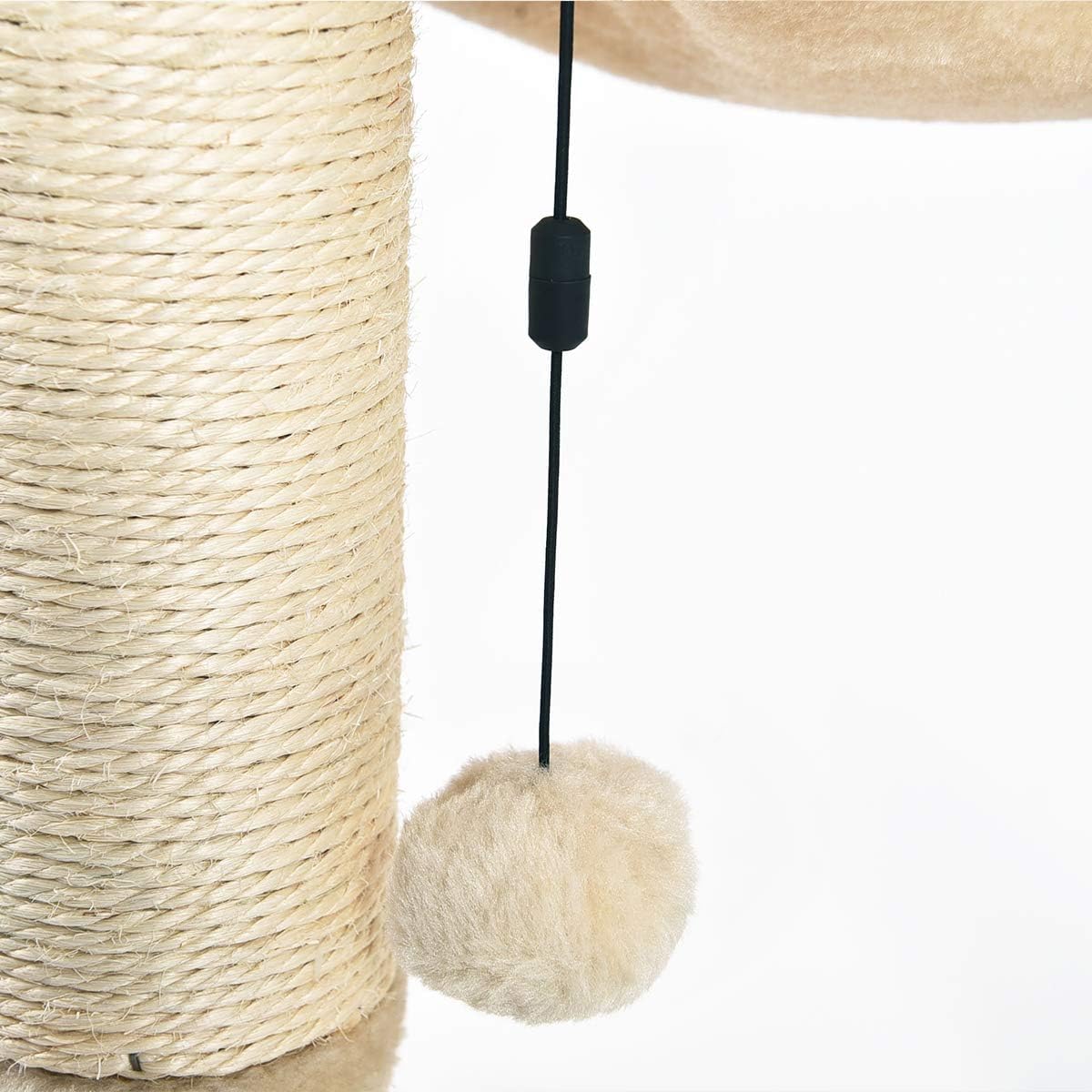 Close-up of soft plush ball toy hanging from cat hammock post