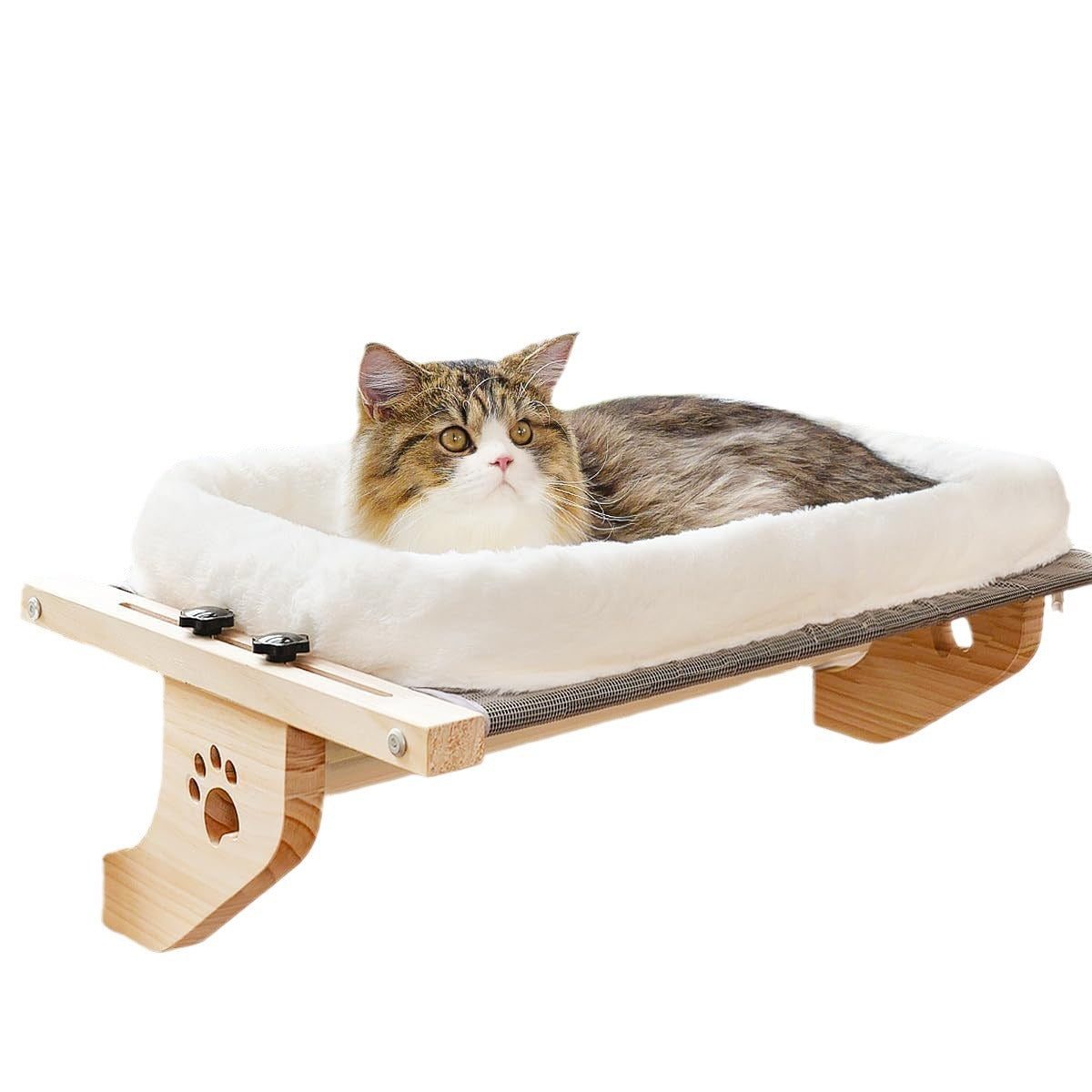 Fluffy cat lying on a wall-mounted cat window perch bed with soft bolster and wooden frame
