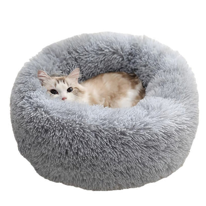 Plush donut cat bed with raised edges and anti-slip bottom