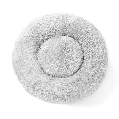 Plush donut cat bed with raised edges and anti-slip bottom